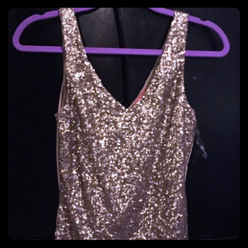 NWT- Gold Sequin Body Suit.